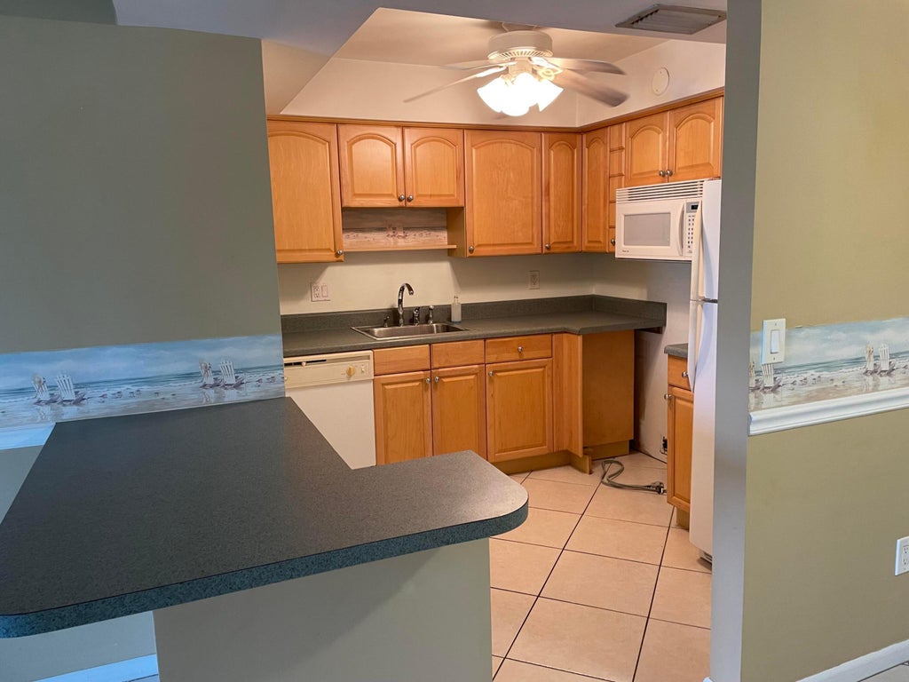 Photo of 950 S KANNER HWY B-7 Highway #B-7, Stuart, FL 34994 (MLS # B26079779)