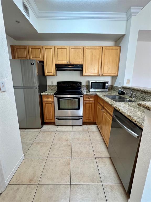 Updated and spacious 2 bedroom 2 bath condo on the second floor with a one car garage and driveway! In the gated community Murano! Bright and open split floor plan. Updated kitchen with stainless steel appliances and granite countertops. Laundry room with full size washer and dryer. Storage room. Private balcony! Fantastic location! Close to major highways, plazas and downtown Atlantic Ave. The community offers a resort style pool, fitness center, indoor racquetball and more! A must see!