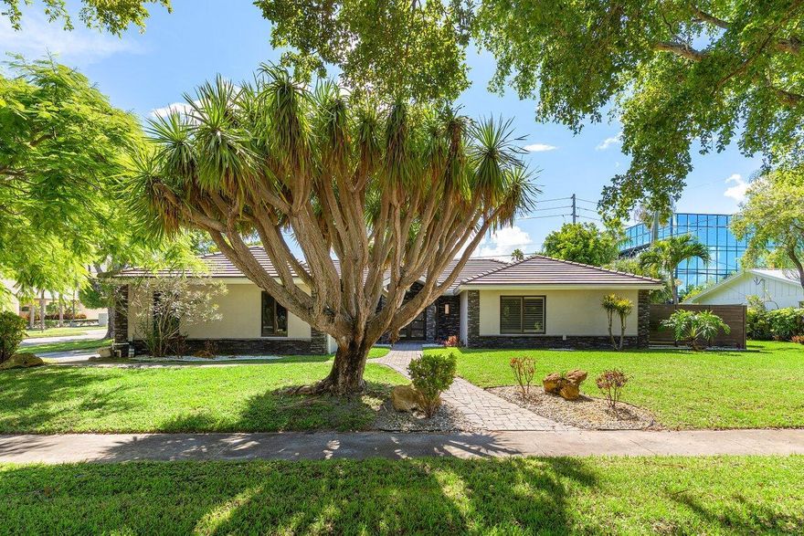 Extensively renovated home with redesigned exterior, added interior enclosure & bath, pool remodel, pavers, new fence, faux-finish garage door, tile floors, crown molding & oversized baseboards. Master suite features tray ceiling, walk-in closet & updated bath. Hurricane-impact windows/doors & garage door. Custom TV enclosure, retractable shades & garage shelving. Major upgrades include epoxy-lined water lines & new gas line for whole-home generator. Systems: 4-ton AC (2021), 1.5-ton AC (2018), water heater (2020), pool heater (2021), pool pump recently replaced.The perfect family home!