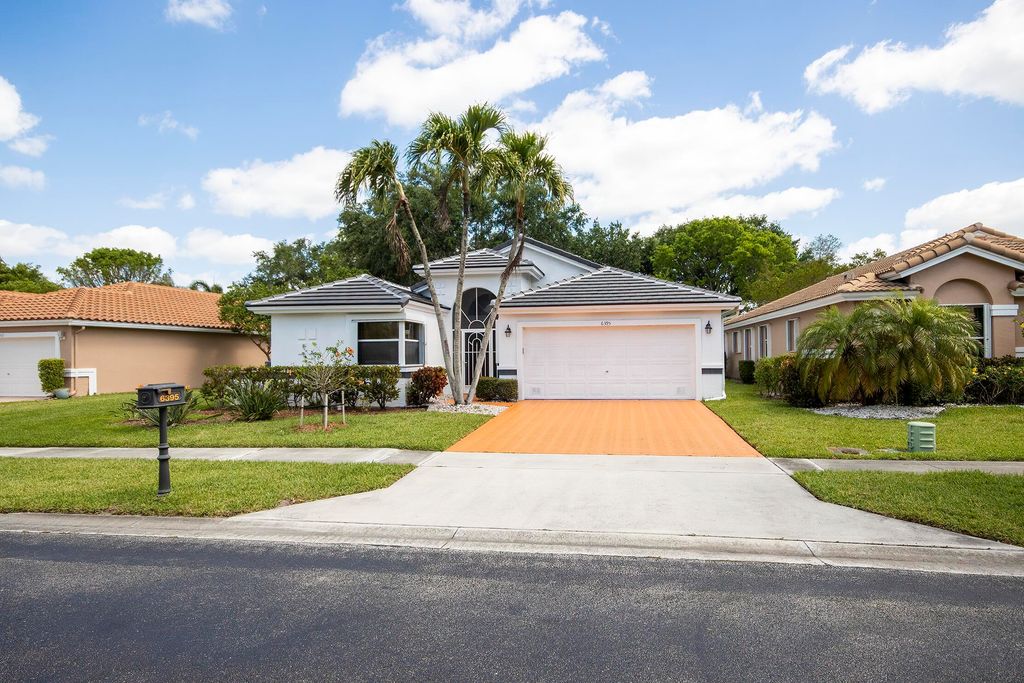 Photo of 6395 Tiara Drive, Boynton Beach, FL 33437 (MLS # B26020093)