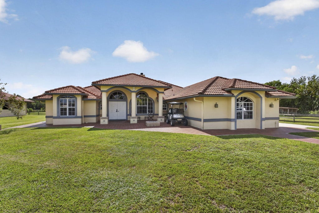 Photo of 2564 Deer Run Trail, Loxahatchee, FL 33470 (MLS # B26043870)