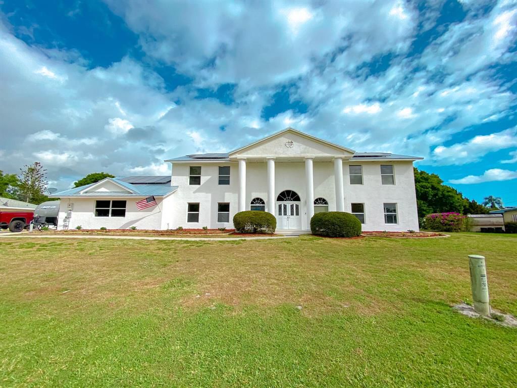 Photo of 8704 Citrus Park Boulevard Blvd, Fort Pierce, FL 34951 (MLS # R10782308)