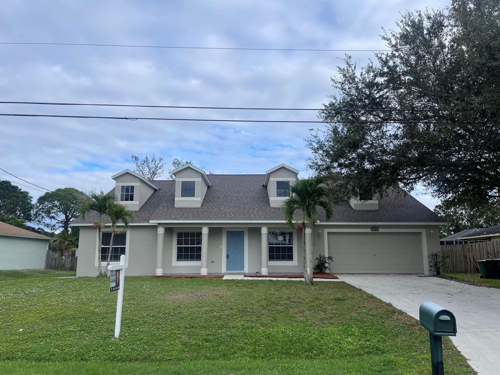 Photo of 2761 SW East Calabria Circle, Port Saint Lucie, FL 34953 (MLS # R10923844)
