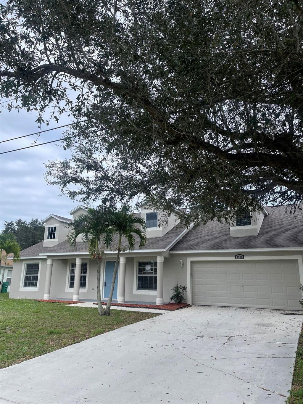 Photo of 2761 SW East Calabria Circle, Port Saint Lucie, FL 34953 (MLS # R10923844)