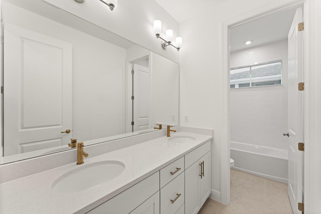 Photo of 10590 SW Pioneer Parkway, Palm City, FL 34990 (MLS # B26082036)