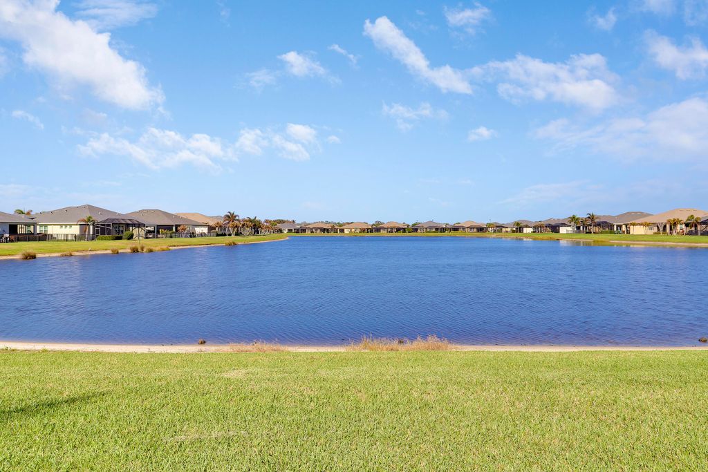 Photo of 12871 SW Lake Fern Circle, Port Saint Lucie, FL 34987 (MLS # B26001498)