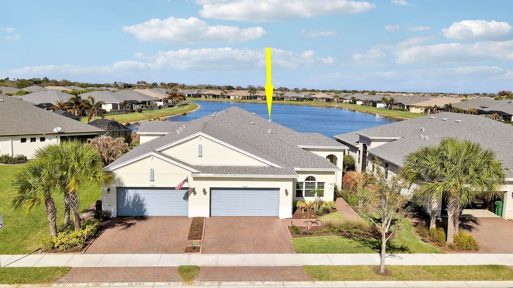 Photo of 12871 SW Lake Fern Circle, Port Saint Lucie, FL 34987 (MLS # B26001498)