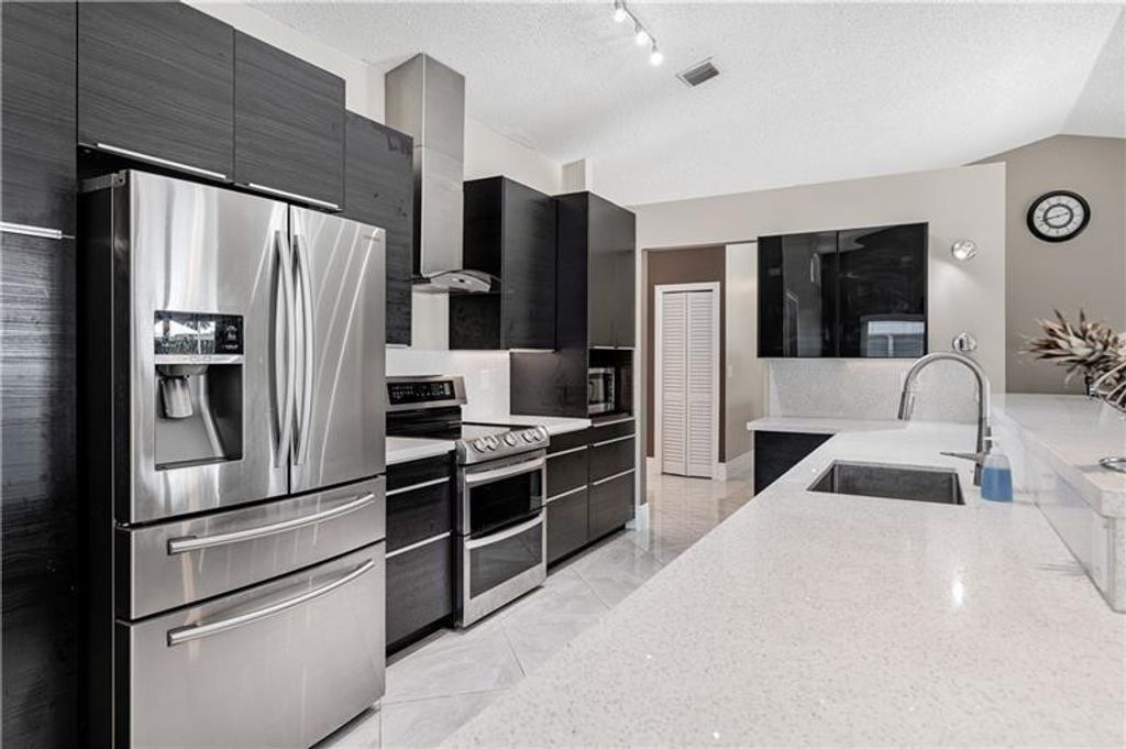 Photo of 7200 SW 20th Street, Plantation, FL 33317 (MLS # B26026499)