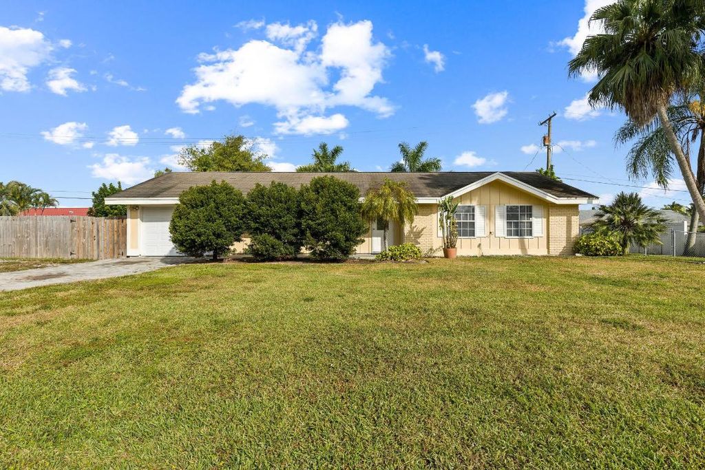 Photo of 9199 Lantern Drive, Lake Worth, FL 33467 (MLS # R11154374)