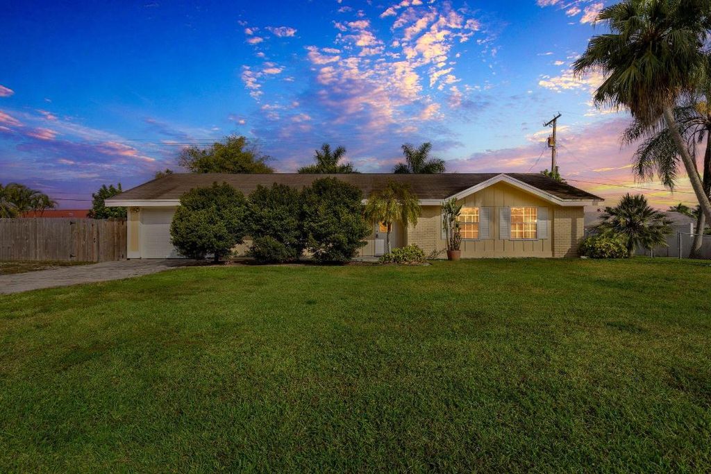 Photo of 9199 Lantern Drive, Lake Worth, FL 33467 (MLS # R11154374)