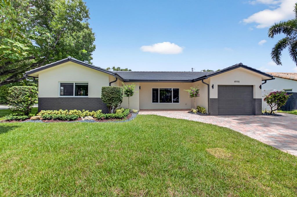 Photo of 4998 NW 4th Avenue, Boca Raton, FL 33431 (MLS # R11107001)