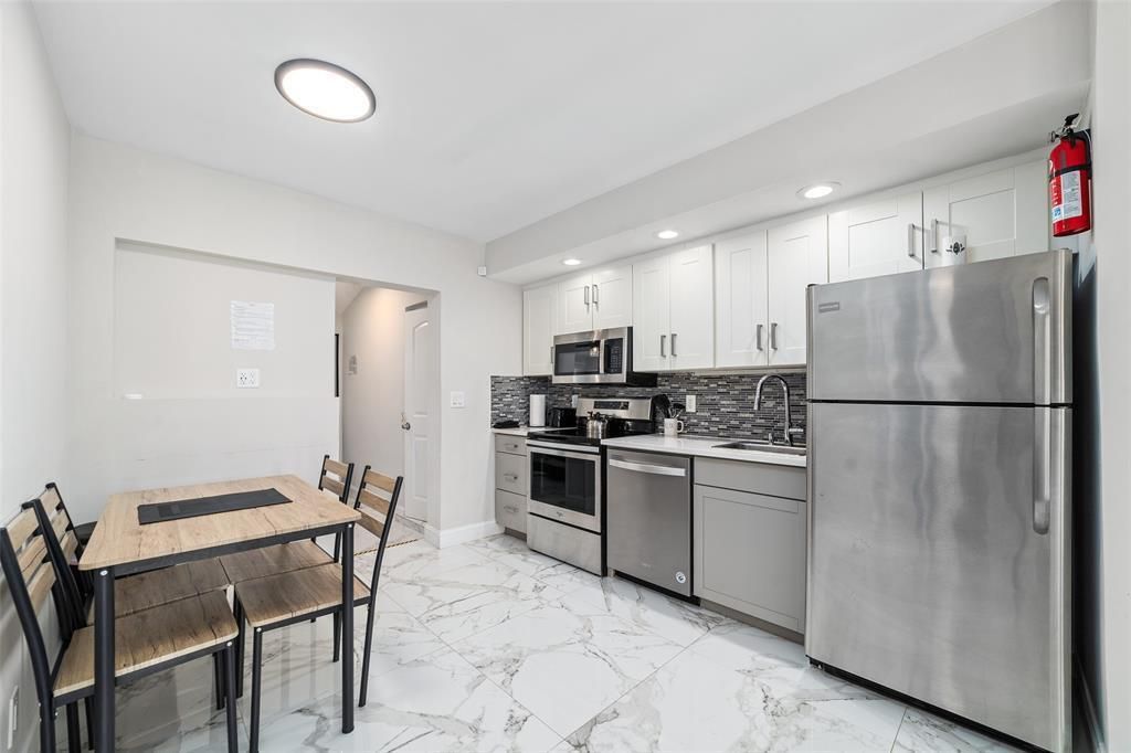 Photo of 1479 SE 4 Avenue, Deerfield Beach, FL 33441 (MLS # R11024808)