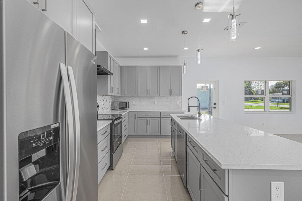 Photo of 5310 Deleon Avenue, Fort Pierce, FL 34951 (MLS # R11010607)