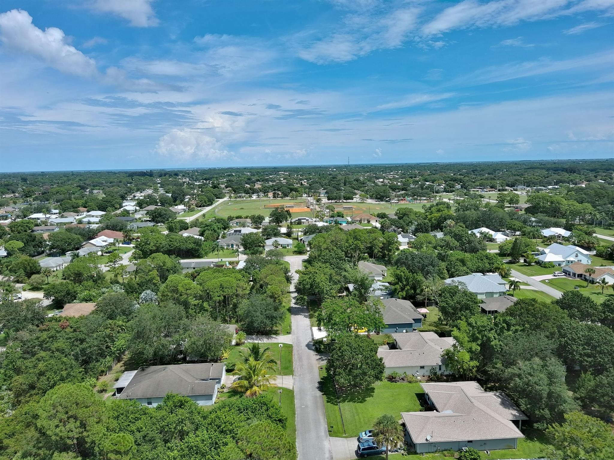 Discover the perfect canvas for your dream home on this centrally located vacant lot in Sebastian! Enjoy the benefit of no impact fees, already paid with the previous home, making this an ideal opportunity for builders and homeowners alike. With an adjacent lot also available, you can expand your dream and create nearly half an acre of your own private oasis. The property features mature trees, offering natural beauty and shade. Enjoy easy access to all the amenities you desire, from shopping and dining to parks and recreation.