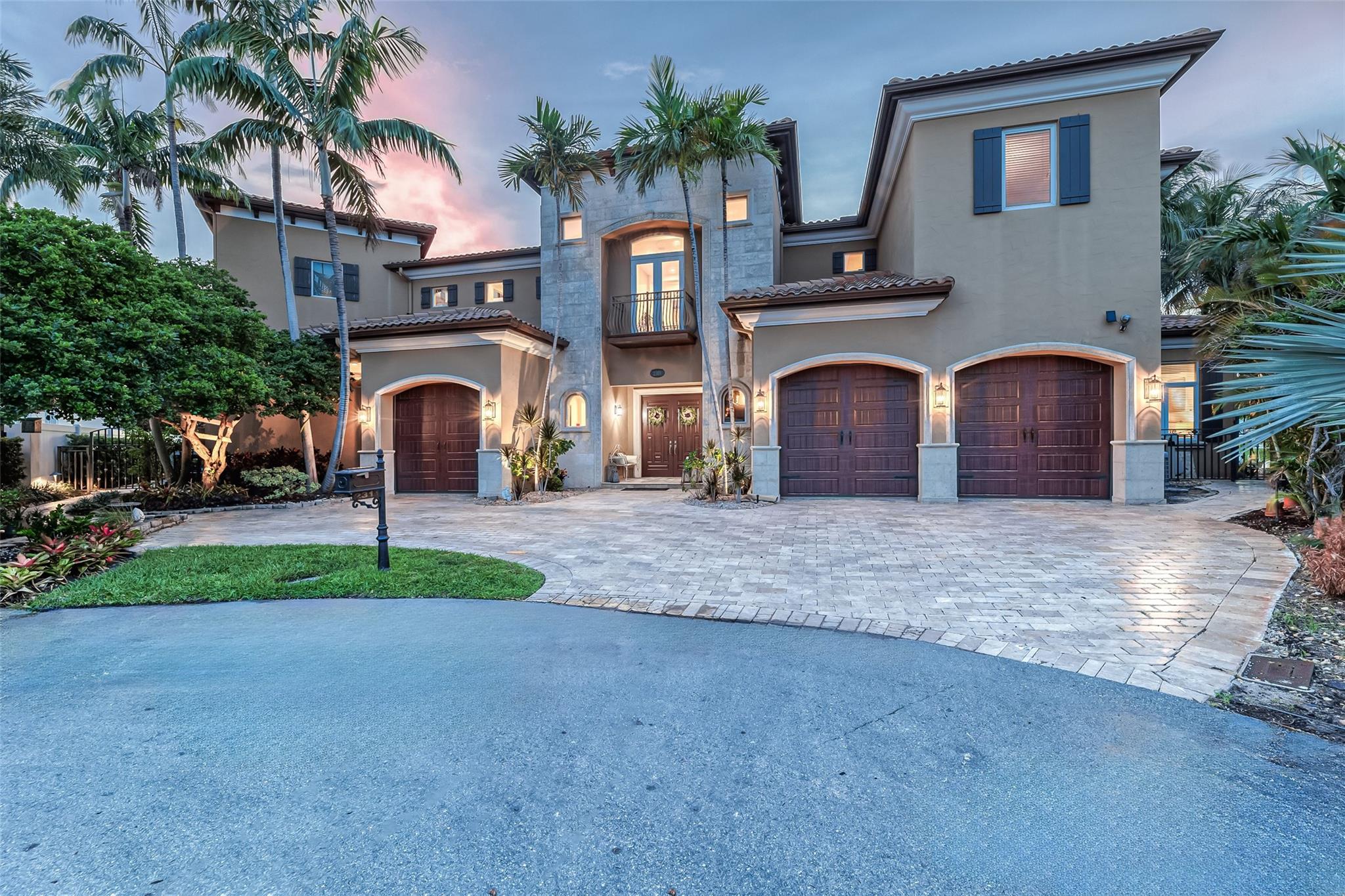 Stunning Home! This house sits on a point lot and has 210' of waterfront in beautiful Lighthouse Point. Deep water, ocean access, NO FIXED BRIDGE. Beautifully updated 6 bedroom, 6.5 bathroom home with a heated salt water pool that includes a lap lane, outdoor kitchen area, artificial turf and 3 car garage, heated salt water pool with a lap lane, outdoor kitchen area, artificial turf. Inside this home the kitchen features beautiful high end appliances with a 6 burner range, two dishwashers, two refrigerators and freezers along with a warming drawer. All bedrooms have beautiful wood flooring. Master bathroom has been completely remodeled. This home also includes a whole house generator with a dedicated propane tank and so much more.