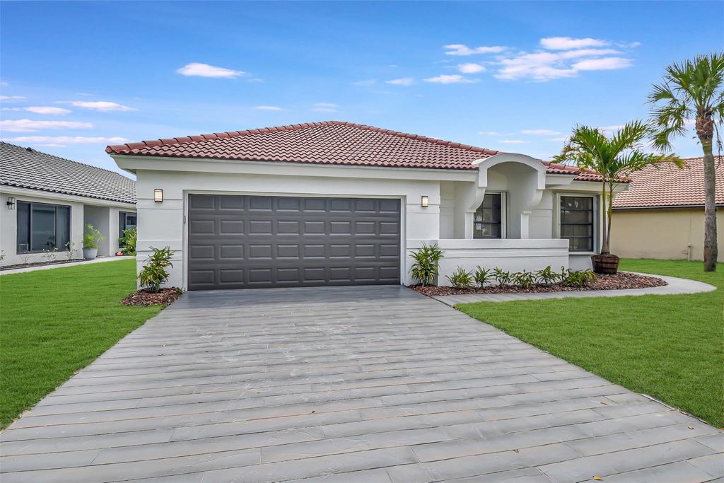 Photo of 11092 Highland Circle, Boca Raton, FL 33428 (MLS # F10409896)