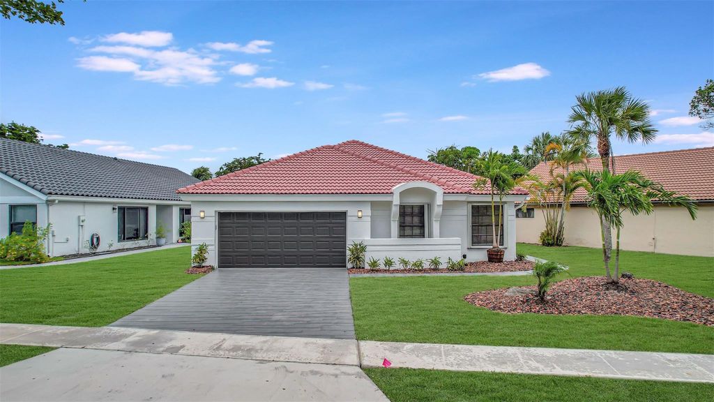 Photo of 11092 Highland Cir, Boca Raton, FL 33428 (MLS # F10409896)