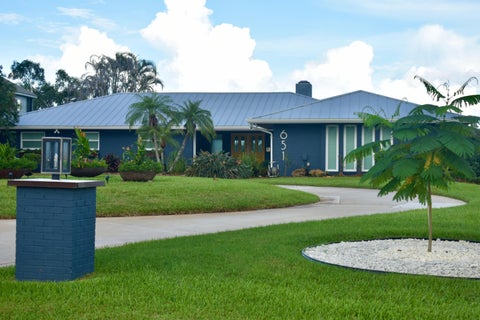 Photo of 651 SE Hidden River Drive, Port Saint Lucie, FL 34983 (MLS # B26071218)