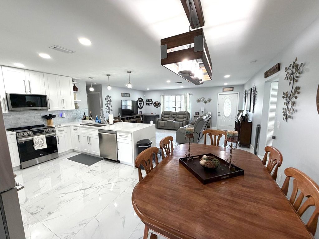 Photo of 357 Las Palmas Street, Royal Palm Beach, FL 33411 (MLS # B26009913)