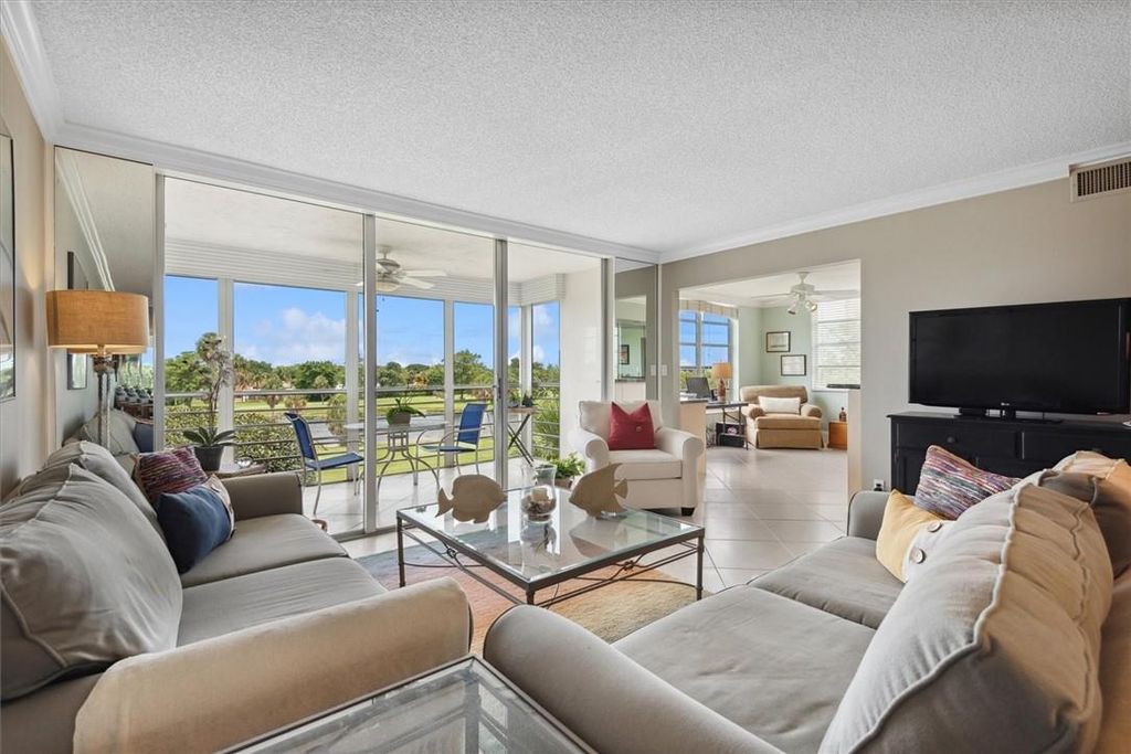 Photo of 806 Cypress Blvd #401, Pompano Beach, FL 33069 (MLS # F10387740)