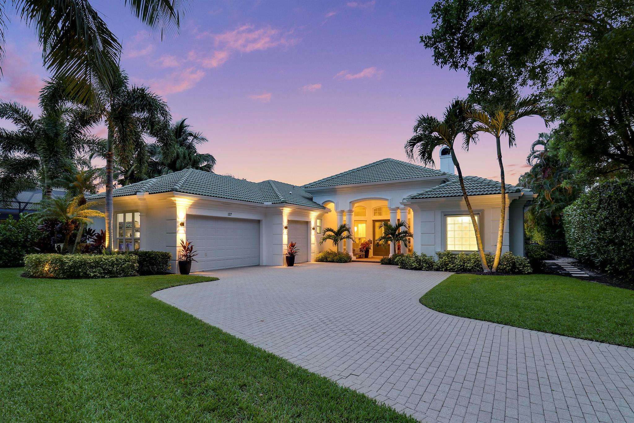 Discover this stunning lakefront custom-built home privately situated at the end of a cul-de-sac within the exclusive gated community of Mystic Cove. Spanning an impressive 3,712 square feet under air, this remodeled home features 4 spacious bedrooms, plus bonus room/extra bedroom, and a dedicated office, 4 luxurious baths, and a 3-car garage. Culinary enthusiasts will adore this expansive chef's kitchen, complete with Fulgor Milano induction stove, oven, and refrigerator. This beautiful kitchen has custom cabinetry offering ample storage and generous quartz counter space.The primary suite occupies the entire east wing of the home, complemented by a lavishly remodeled spa bath for your ultimate indulgence, while showcasing tranquil views of the pool and lake with lighted fountain.