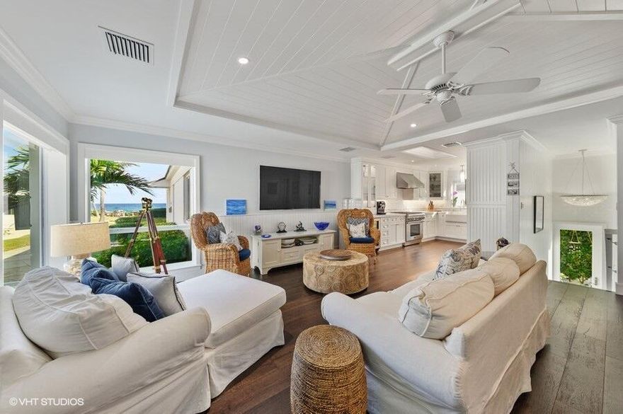 Oceanfront Dream: Rare Fee Simple Ownership in Highland Beach - No HOA!Discover coastal living redefined in this exclusive Highland Beach gem - one of only six residences with **direct oceanfront access and NO HOA constraints.** This magnificent two-story townhome represents that elusive Florida treasure: fee simple ownership steps from pristine shoreline.Completely transformed through a $1M reconstruction in 2017 by Classic Homes of South Florida, Inc., this home stands as a testament to superior craftsmanship. Category 5 hurricane-rated construction, PGT sound proofing impact rated windows and doors, and exquisite designer finishes throughout provide comfort and peace-of-mind year round.