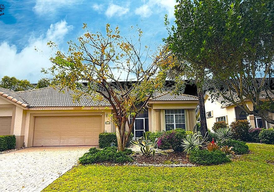 Enjoy expansive water views from the enclosed, air-conditioned patio of this bright 3-bedroom, 2-bathroom villa. Located in a secure, manned-gated community, the home features an open layout with high ceilings and a Southeast exposure that brings in plenty of natural light.  Property Highlights:  Space: 3 bedrooms, 2 bathrooms, and a 2-car garage.  Updates: Brand new carpet in the main bedroom and neutral colors throughout.  Outdoor Living: Large sunroom/patio with AC overlooking the water.  Location: Quiet interior lot within the gated section of Aberdeen.