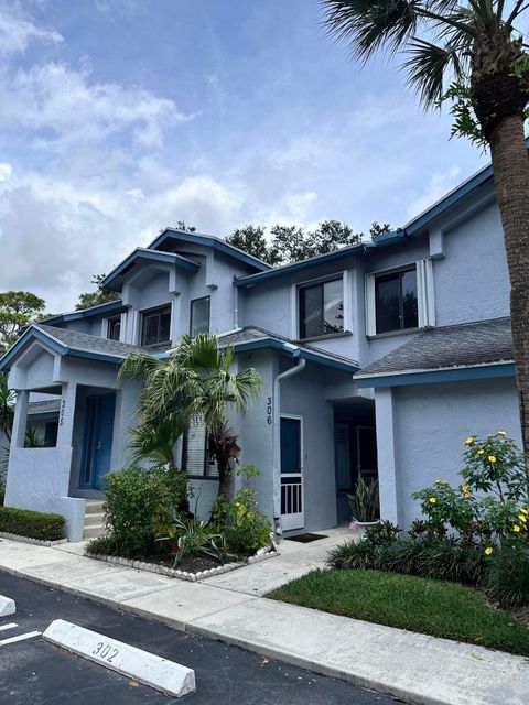 Photo of 306 Harbour Pointe Way, Greenacres, FL 33413 (MLS # B26018420)