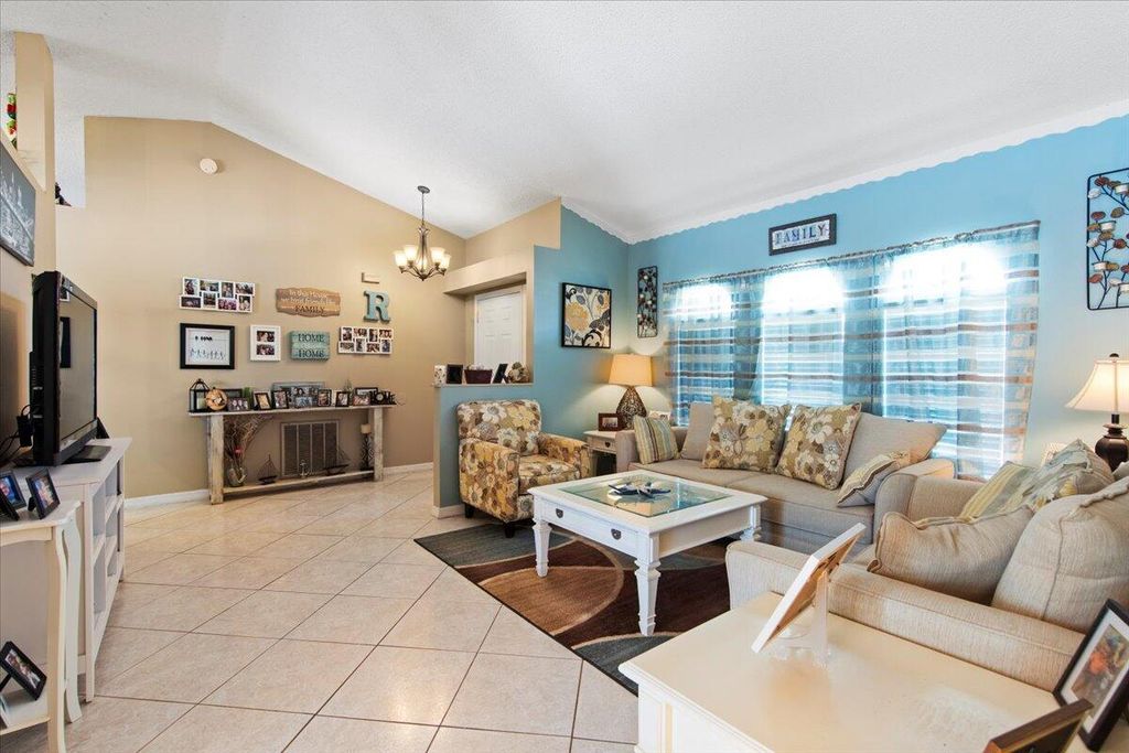 Photo of 4565 SW Floral Street, Port Saint Lucie, FL 34953 (MLS # R10990359)