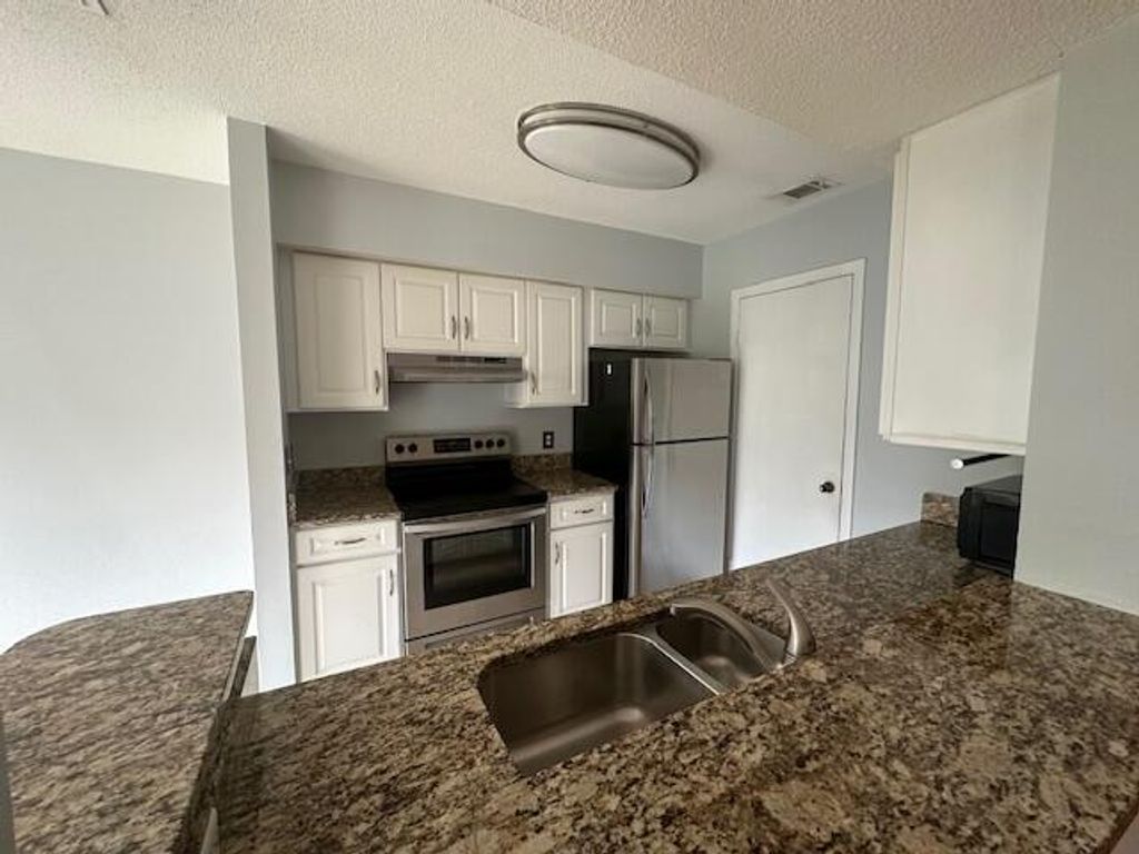 Photo of 815 W Boynton Beach Boulevard #9-203, Boynton Beach, FL 33426 (MLS # R10954056)