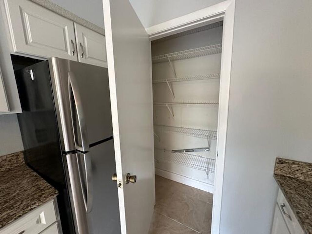 Photo of 815 W Boynton Beach Boulevard #9-203, Boynton Beach, FL 33426 (MLS # R10954056)