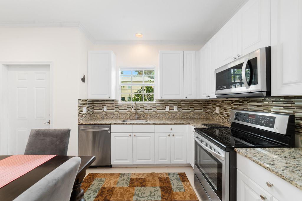 Photo of 4216 Leo Lane #Unit 4f, Riviera Beach, FL 33410 (MLS # B26013672)