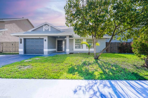 Photo of 3102 NW 123rd Terrace, Sunrise, FL 33323 (MLS # B26007125)
