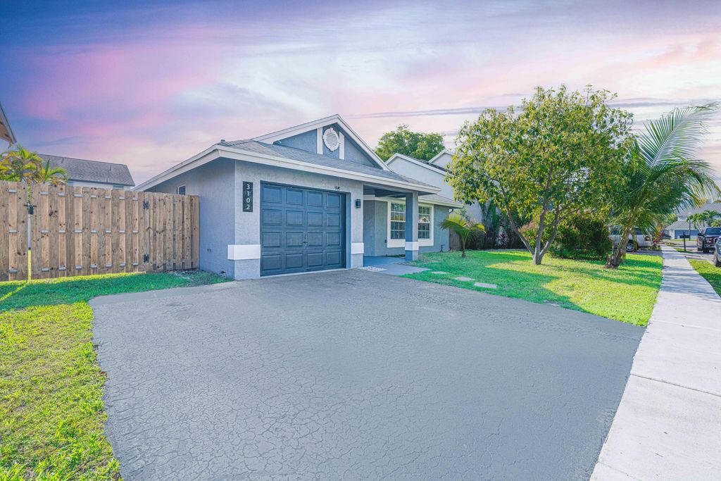 Photo of 3102 NW 123rd Terrace, Sunrise, FL 33323 (MLS # B26007125)