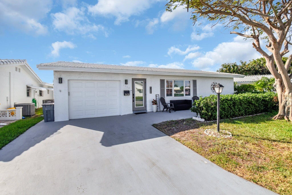Photo of 1505 SW 20th Street, Boynton Beach, FL 33426 (MLS # R11063072)