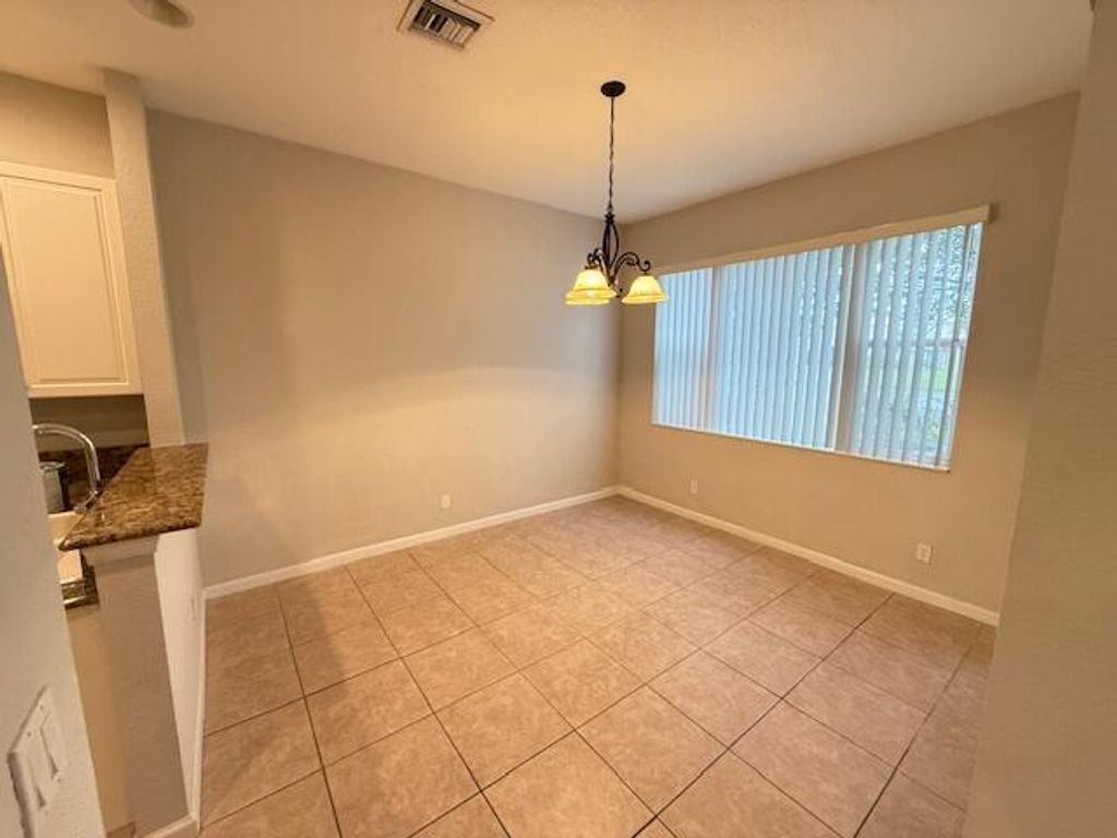 Photo of 2210 SW Portsmouth Lane, Port Saint Lucie, FL 34953 (MLS # R11030291)