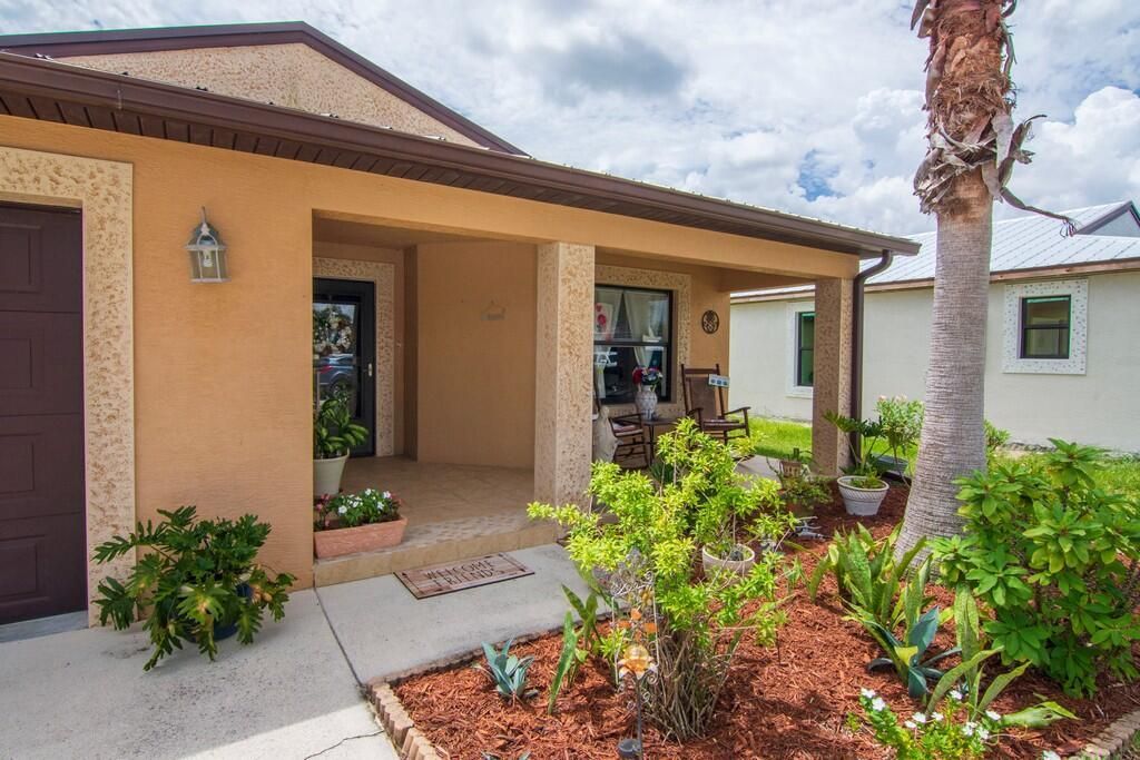 Photo of 14505 Dulce Real Avenue Ave, Fort Pierce, FL 34951 (MLS # R10824873)