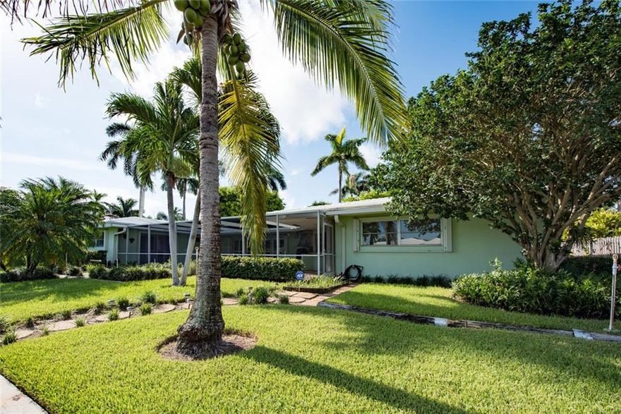 The First time on the market in 52 years! Immaculate waterfront home with generous dimensions set in the heart of East Coral Ridge. Impeccably maintained ranch could be renovated to enhance features that include immense living room; formal dining room and triple split bedrooms centered around screened pool enclosure with deep eaves for al fresco entertaining. Manicured gardens lead to 100' water frontage & 90' dock with ocean access - Or - take advantage of rising neighborhood values and build new.