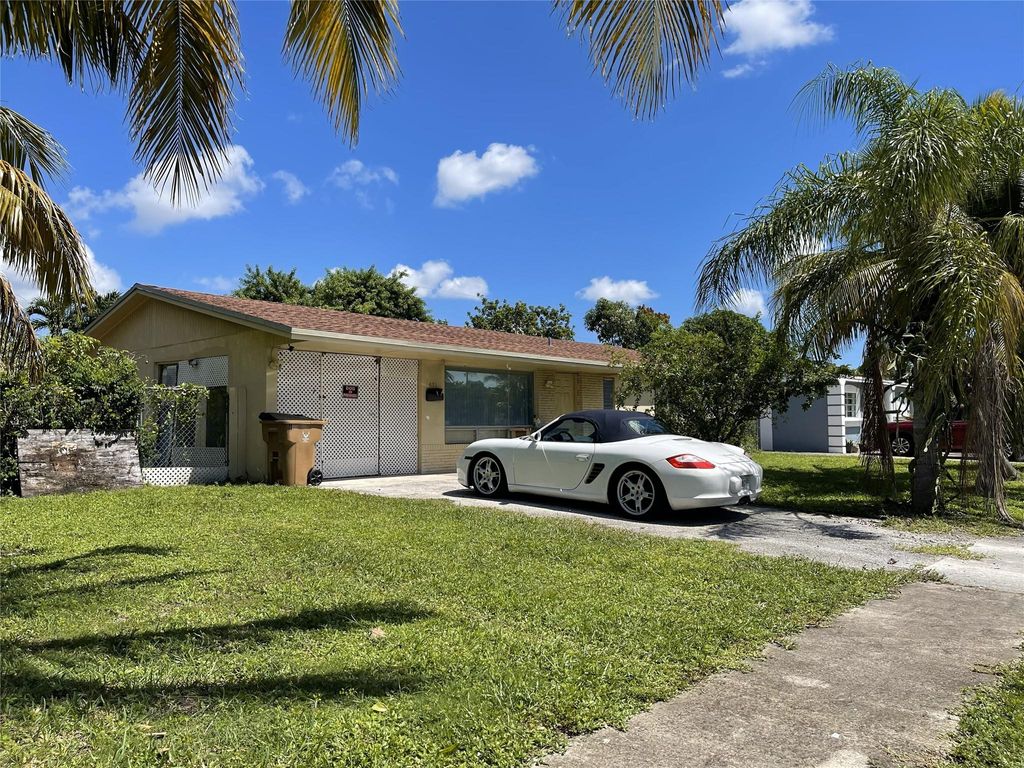 Photo of 671 NW 38th St, Deerfield Beach, FL 33064 (MLS # F10539969)