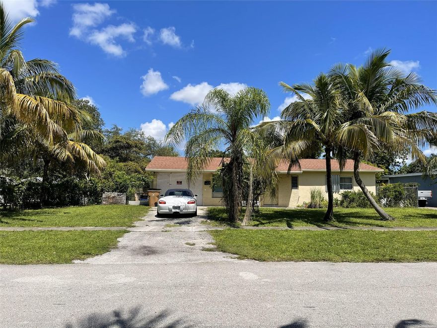 Absolutely affordable house for first time home buyers or investors! NO HOA community of Bonnie Loch located in a very nice and quiet area. 12 minutes to Deerfield Beach/Pompano Beach. Easy access to I95. This corner lot house needs your ideas to make it your perfect style home. 2018 Roof, newer washer and stove. House is all travertine floors; Bathroom tiles are in good condition. All kind of Asian fruit trees around the house such as soursop, sugar apple, guava, star apple, dragon fruit on this 8400sqft lot home. Enclosed carport for privacy; there is an addition handyman working room adjacent to the 3rd bedroom making this house very spaces. PRICE TO SELL ** rare find ** will go fast ** give yourself a chance to check it out before it is gone.