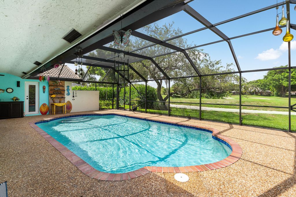 Photo of 10094 Crosswind Road, Boca Raton, FL 33498 (MLS # R11098044)