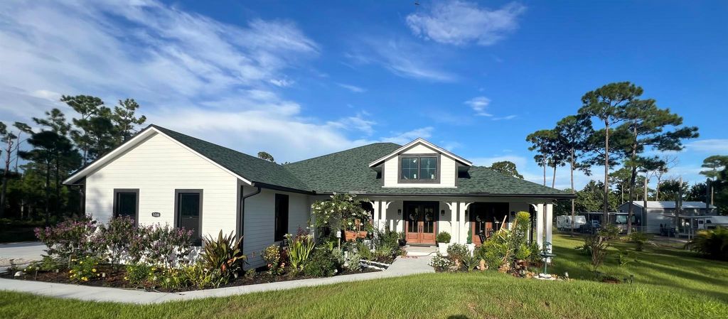 Photo of 5088 Slash Pine Trail, Fort Pierce, FL 34951 (MLS # R11117933)