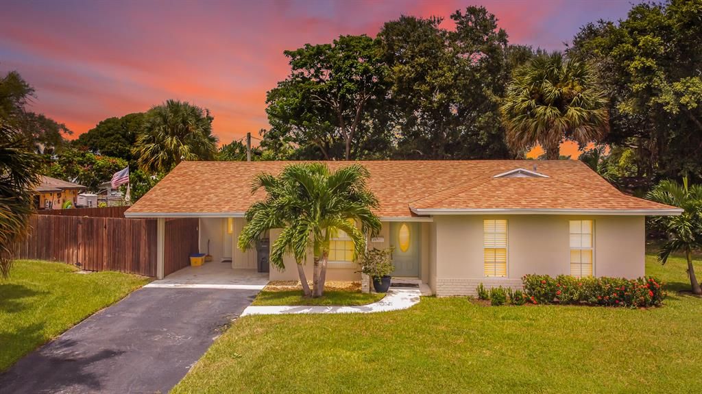 Photo of 12145 Easterly Avenue, Palm Beach Gardens, FL 33410 (MLS # R10742066)