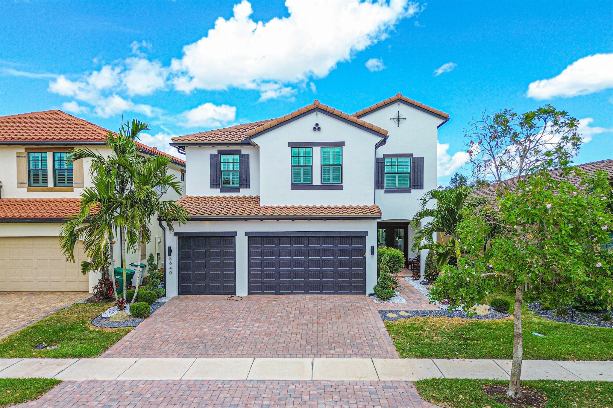 Luxurious living in one of the most sought after communities in Parkland. This stunning 'Tern Model Home' was built in2019 by WCI and offers 5 bedrooms, 4 bathrooms with soaring 21 foot ceilings and a grand double door entry. Enjoy entertaining with this open kitchen and family room with fantastic garden and pool views. Backyard is Astro-turf for ease of maintenance. High Impact Windows throughout. Featuring a 3 car garage.Located in a top A rated school district. The community has resort style amenities with clubhouse, pool, fitness center and basketball and tennis.