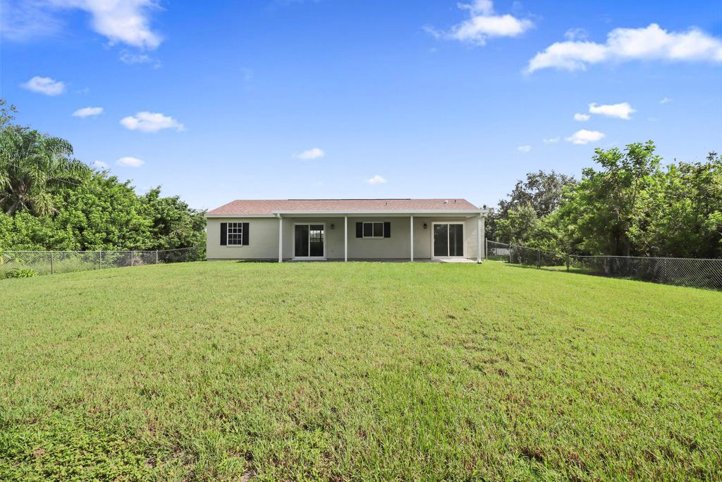 Photo of 610 NW Billiar Avenue, Port Saint Lucie, FL 34983 (MLS # R11121362)