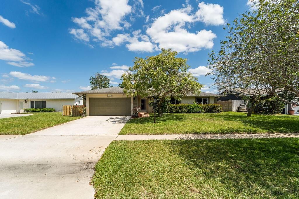 Photo of 2550 Lochmore Road, Riviera Beach, FL 33407 (MLS # R11082297)