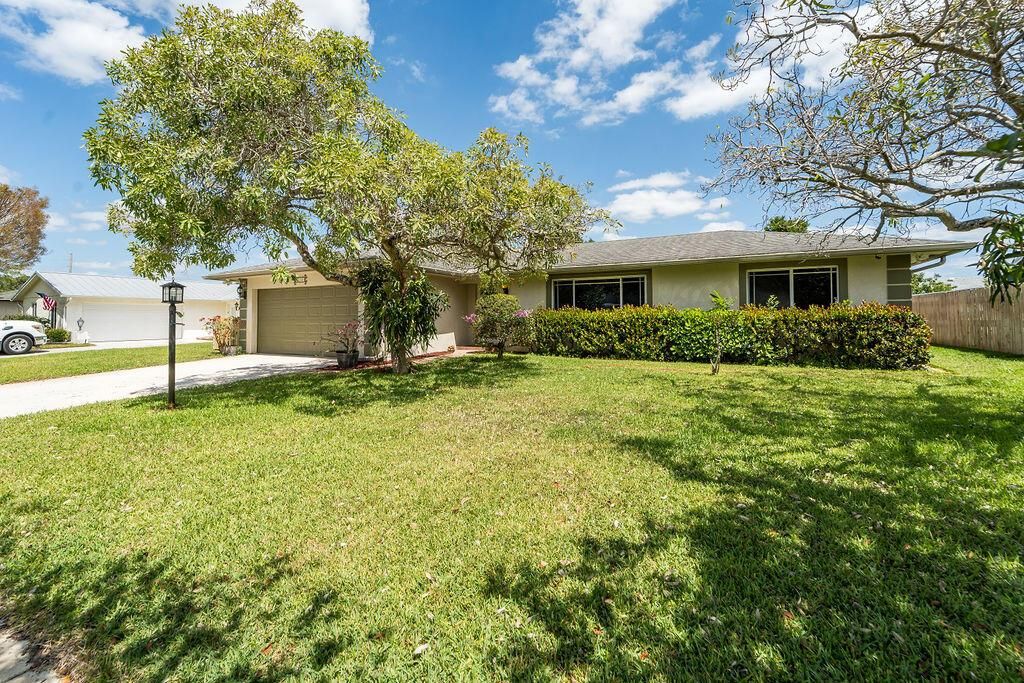 Photo of 2550 Lochmore Road, Riviera Beach, FL 33407 (MLS # R11082297)