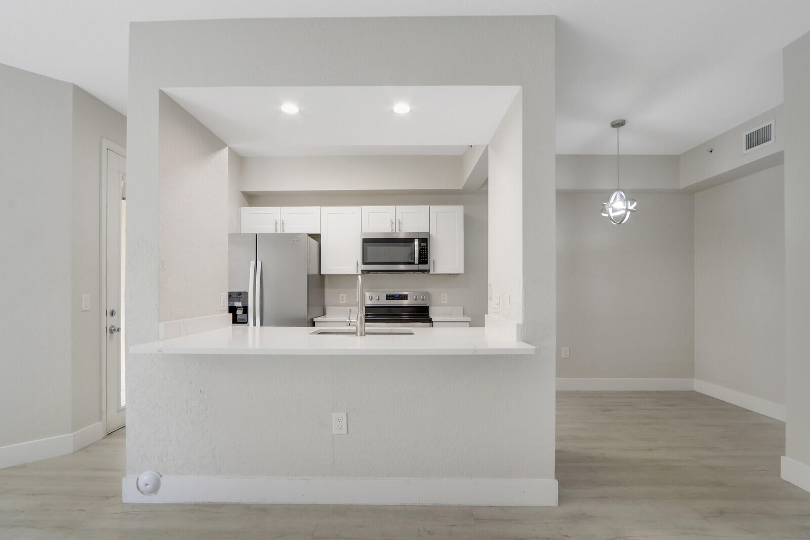 Residences At Legacy Place. Resort Style 1 Bedroom Fully Remodeled. Luxury Vinyl Flooring Throughout. Quartz Counter Tops, Stainless Appliances & Custom Lighting. Must See!