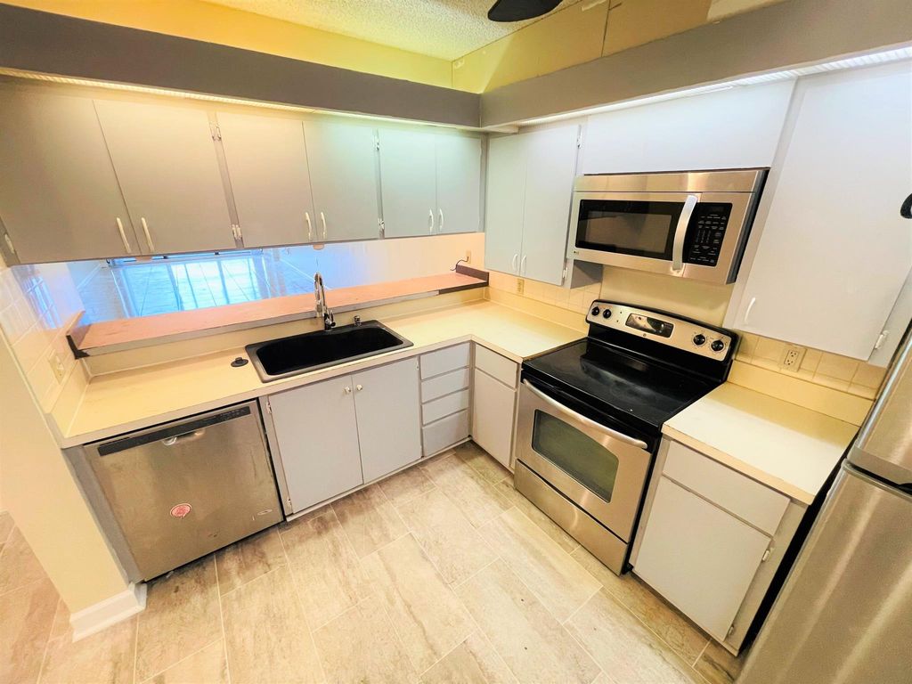 Photo of 2621 Village Boulevard #105, West Palm Beach, FL 33409 (MLS # R10792638)