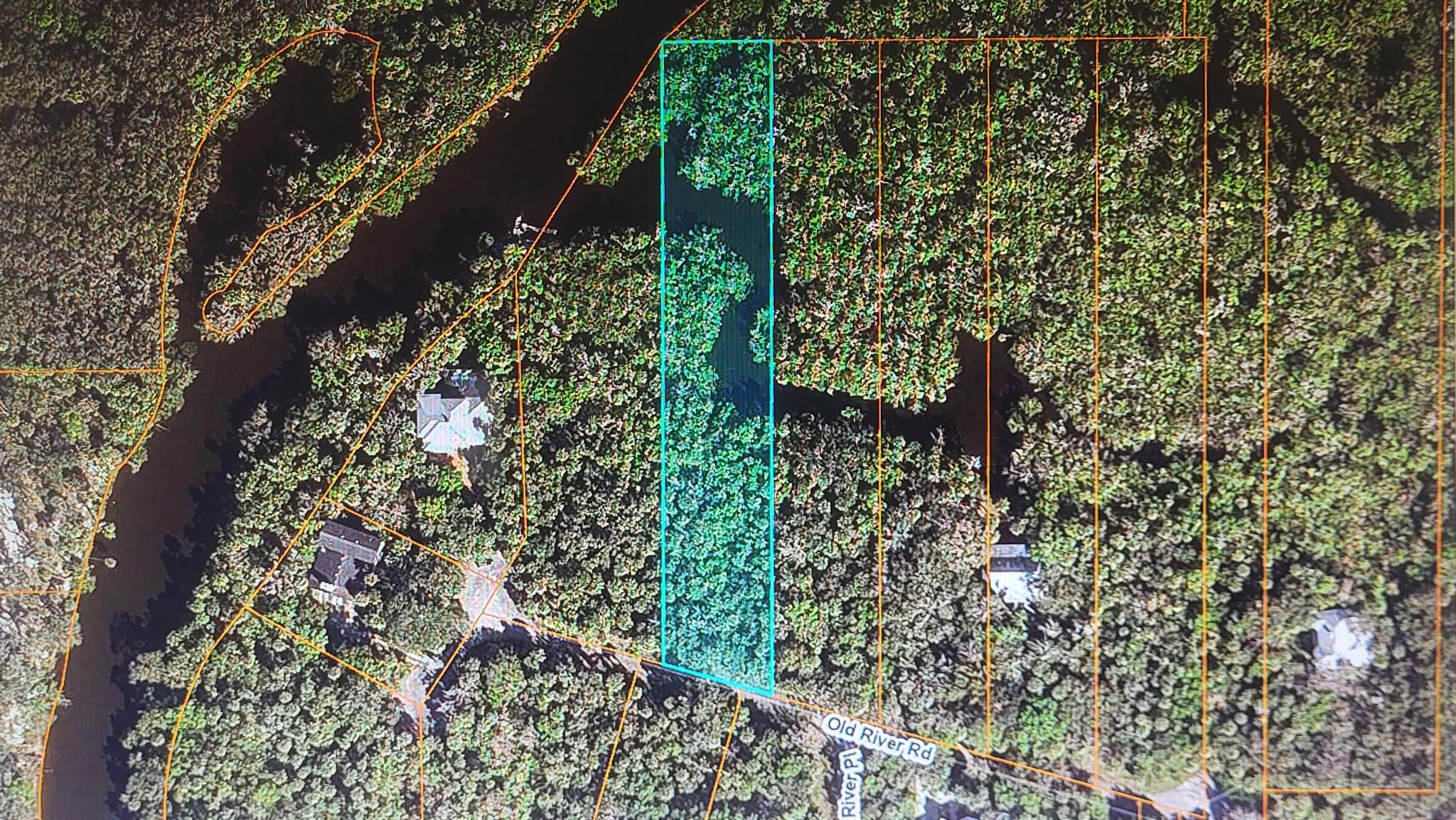 Peaceful, secluded 1.1 acre residential lot located in a cul-de-sac setting next to the St. Lucie River in White City. This property is also available with seller financing.